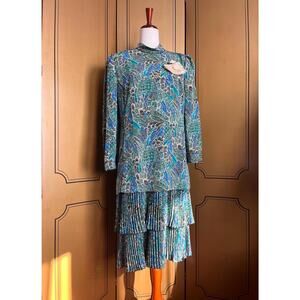 Long sleeves dress with all over print and pleated skirt, size 12